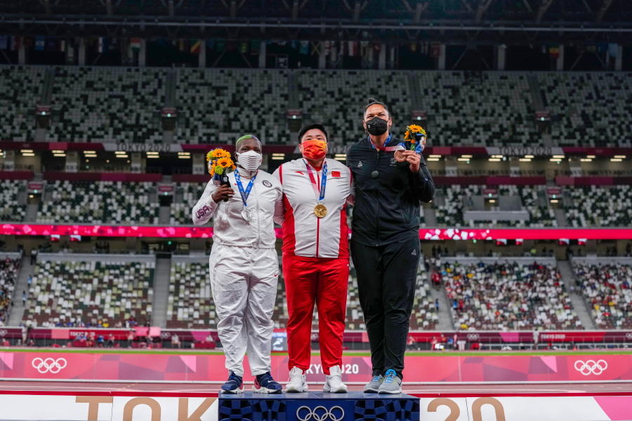 From left to right Saunders Raven, Gong Lijiao, and Valerie Adams