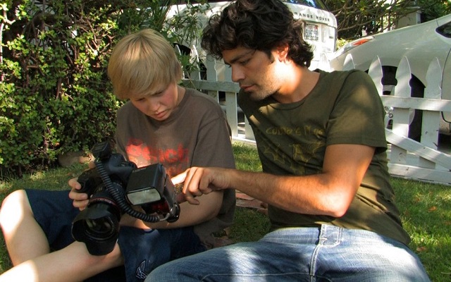 Adrian Grenier and Austin Visschedyk in 'Teenage Paparazzo'
