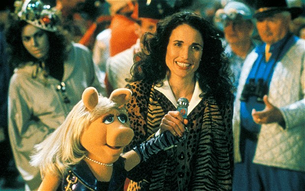 Andie MacDowell (Shelley Snipes) and Miss Piggy in Muppets from Space