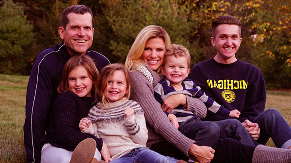Jim and Sarah Harbaugh with their children