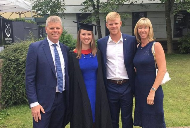 Kyle Edmund and his parents at his sister's graduation